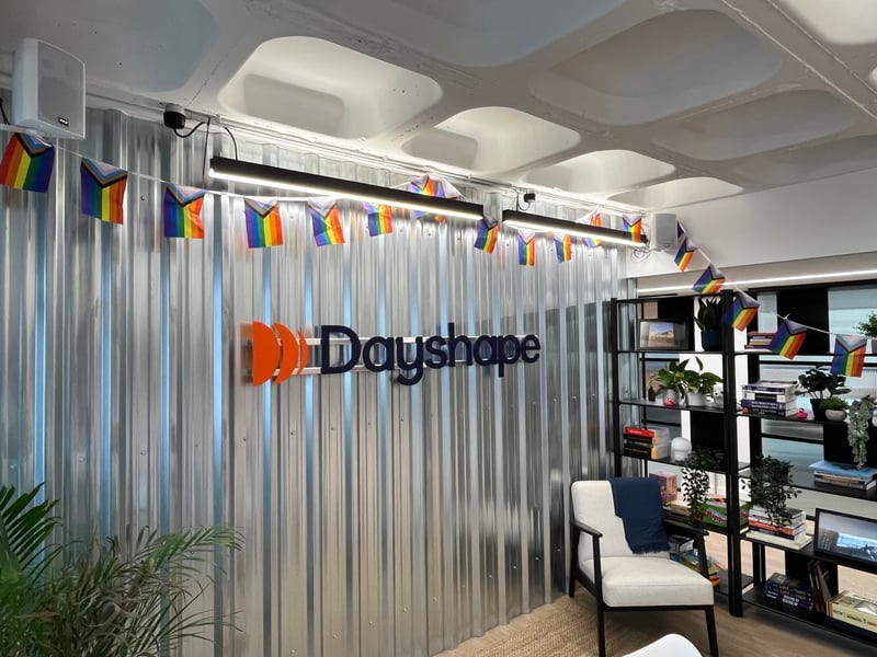 The Dayshape office decorated with Pride Progress Flags